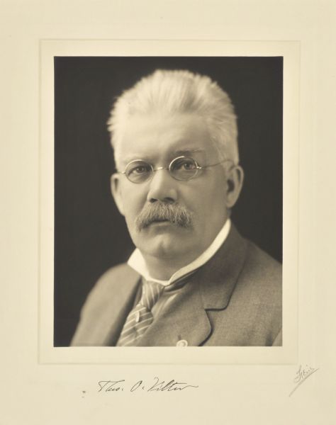 Quarter-length studio portrait of Theodore O. Vilter, Milwaukee company president.