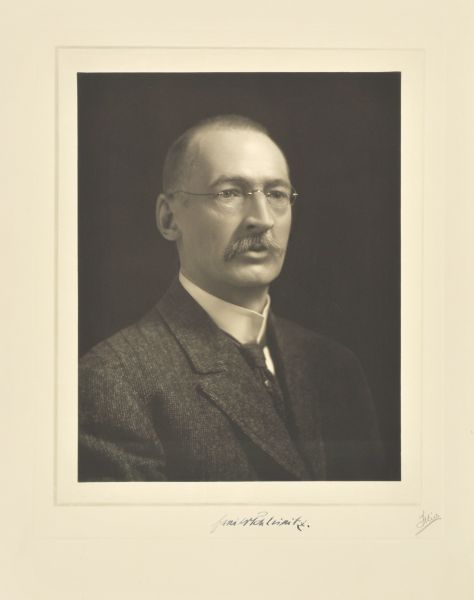 Quarter-length studio portrait of Emil von Schleimitz, Milwaukee journalist.
