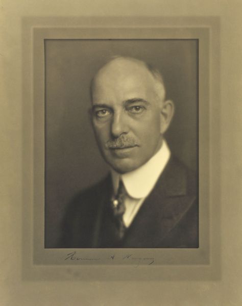 Quarter-length studio portrait of Herman A. Wagner, Milwaukee company president.