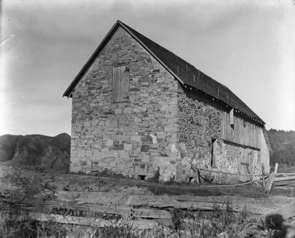 Exterior view of a stone hop house built by Jesse Carpenter in 1894. It was sold to James Stuart "when the crash came."