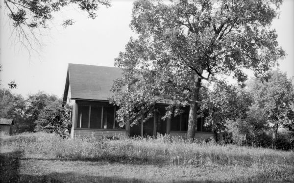 View from yard of small cottage standing on the northwest shore of Lake Mendota on the site of Rowan, also known as the St. Cyr stopping place.