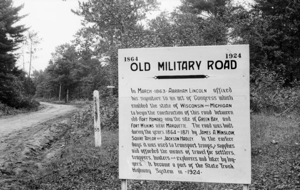 A sign north of Shawano marks the Military Road, built 1864-1871, from Green Bay, Wisconsin, to Marquette, Michigan. In 1924 the Wisconsin portion of the road became part of the state trunk highway system.
