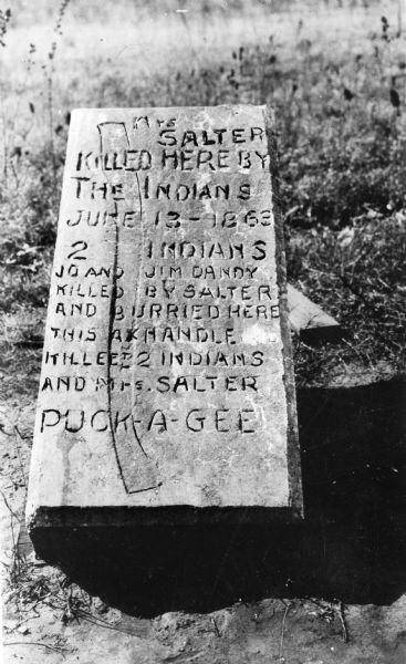 Salter marker between Necedah and New Lisbon, marks spot where some Indians killed a Mrs. George Salter on June 13, 1863. Mr. Salter had a log tavern here and came home one day to find his wife dead and two drunk Indians. He supposed they had wanted liquor, had been refused and had killed her. Mr. Salter killed both Indians, Jo and Jim Dandy. Mr. Gus Nooney, a friend of Salter, erected this marker.