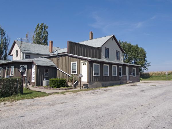 This store, which was originally built in 1840 (and rebuilt after an 1877 fire) was bought in 1891, by Samuel Kerr who continued to sell sugar, flour, molasses, ground coffee, candy; everything from pitchforks to shotguns. His store also became the place to fill an automobile tank and purchase oil.