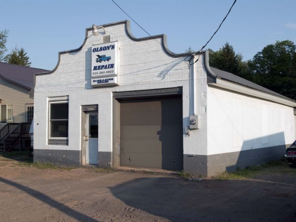 Gus Savera built his service garage along Highway 77 in the mid-1940s. It was constructed out of cinder blocks and featured bright blue trim.
