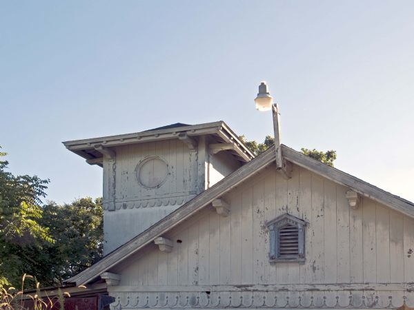 Built in the early 1920s, the station, with its tower, low rooflines, and decorative half-timbering, complemented the designs of the other resort buildings including the small, individual cottages.