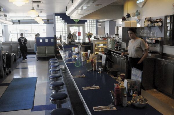 Food not gas is now the fuel of choice at Monty's Blue Plate Diner in Madison. This former station once again serves as the lively neighborhood meeting place.
