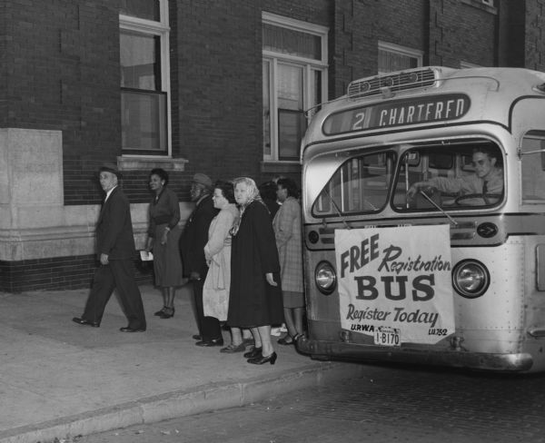 For a 1950 election, the United Packinghouse Workers Union sponsored a free bus to transport people to the voter registration site.