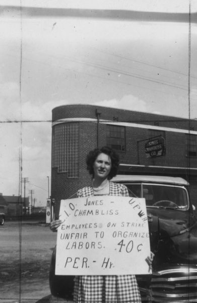 An unidentified striking member of the United Packinghouse Workers of America at the Jones-Chambliss company. This photograph appeared in the Packinghouse Worker newspaper along with the information that the strikes had been facing opposition from local real estate owners and the police in and was an appeal for financial support.