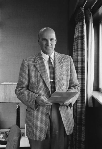 Three-quarter length portrait of Oscar G. Mayer, Jr. (1914-2009), who became president of Oscar Mayer & Co. in 1955. Mayer was also an important Madison philanthropist.
