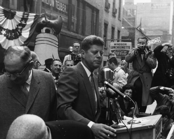 Senator John F. Kennedy campaigning at a labor rally.