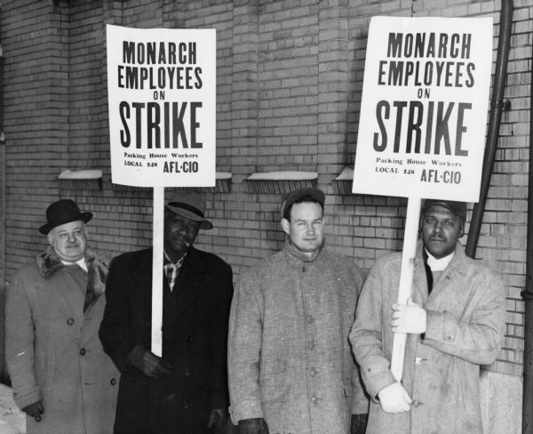 Four members of Milwaukee Local 248 of the United Packinghouse Workers of America on strike against the Monarch company. The UPWA had a long history of organizing integrated locals.