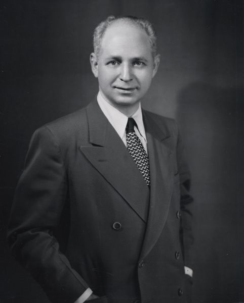 Waist-up studio portrait of Ralph Helstein, president of the United Packinghouse Workers of America.
