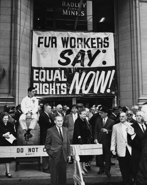 Fur workers rally outside the Radley Fur Company.