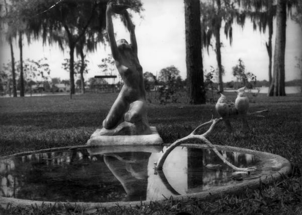 A birdbath on the Folly Farm grounds. Both sculptures were made by Frank O. King.