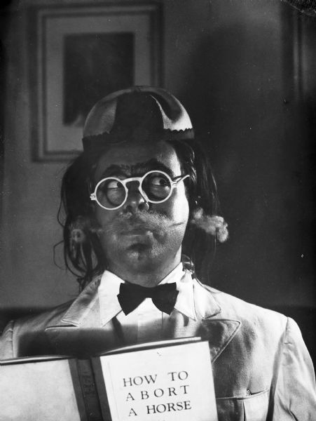 Ray Bradbury came to Milwaukee to visit Bloch. They went to the Gauer "Lab" on Brady Street and they decided to dress him for a photograph.
