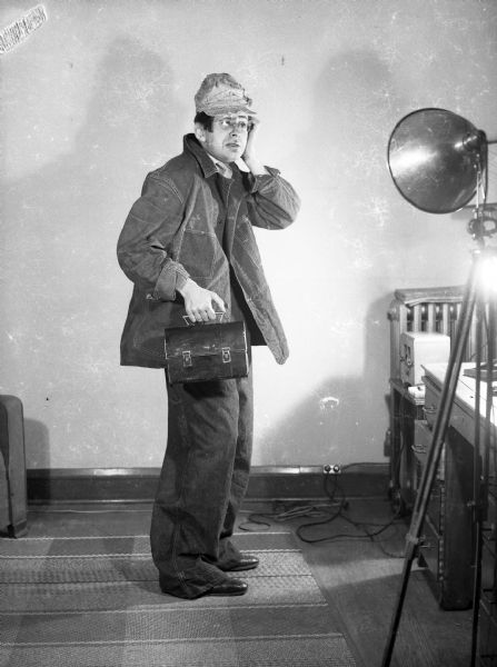 Bloch dressed as a "laborer," worried about what he would do for a living if he couldn't write. The photograph was taken for the "History" scrapbook.