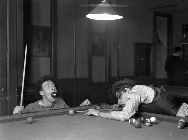 One of a series of humorous photographs of a billiards match Gauer was trying to market to a magazine. Eventually sold to <i>Cheers</i> magazine.