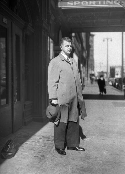 Wasilewsky standing outdoors on sidewalk. He was deciding if he wanted to run for public office.