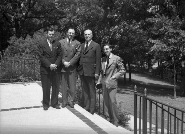 The major players in the Clausen campaign posed outdoors at his home. Harold Gauer is on the far left.