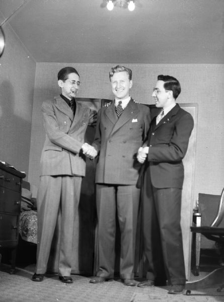 Newly elected mayor, Carl Zeidler, with the "braintrust," of Harold Gauer and Robert Bloch, that put him there. The "boys" are congratulating him on his victory, but shortly after they were cut off from all promised rewards. Zeidlers handlers were worried about the unseemliness of the boys ages.