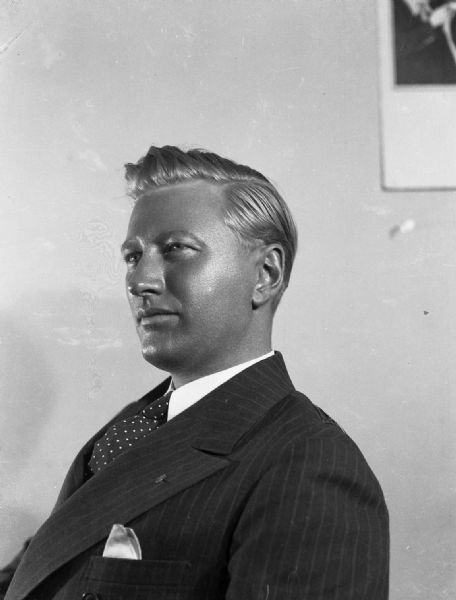 Politician Carl Ziedler, who ran for mayor of Milwaukee. Gauer is quoted in his book <i>Keeping Track of What Happened</i>, "When Hollywood came out with panchromatic makeup the photographer used it on the candidates head, making it look like it was made of lead, but the result was useful as a cover picture on a piece of campaign propaganda."