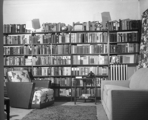 Interior view of a personal library in a home.