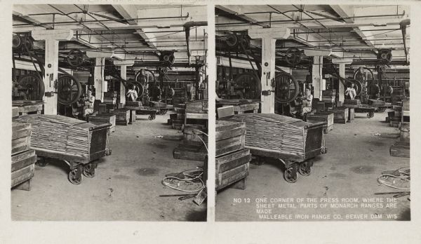 View of the press room. Caption on stereograph reads, "No. 12 One corner of the press room where the sheet metal parts of Monarch ranges are made. Malleable Iron Range Co, Beaver Dam, Wis."