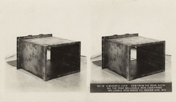 A close-up of a Monarch oven. Caption on stereograph reads, "No. 19 A Monarch oven, View from the rear, showing the rear malleable iron oven-frame. Malleable Iron Range Co, Beaver Damn, Wis."