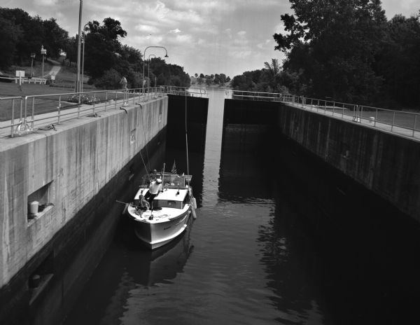 A boat in the Fox River Canal, headed up river. This particular lock, the Ripide Croche Lock, is located just north of Wrightstown.