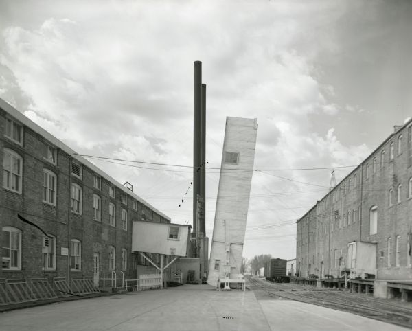 The John Deere farm machinery manufacturing plant. "Bascule" passage between buildings which is raised to let freight cars pass on railroad tracks.