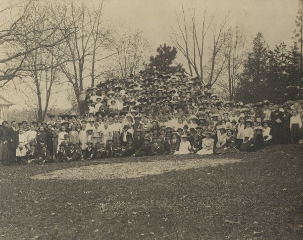 Large group of children and adults pose outdoors at the second annual contest.