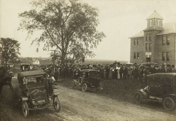 Fair goers gather in front of Union High School.