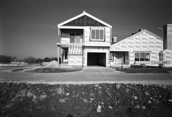 Front view of a house under construction in the Tamarack Trails Subdivision.