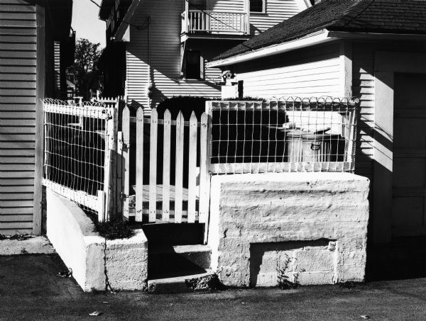 Backyard, fence and wall, North Weil Street.