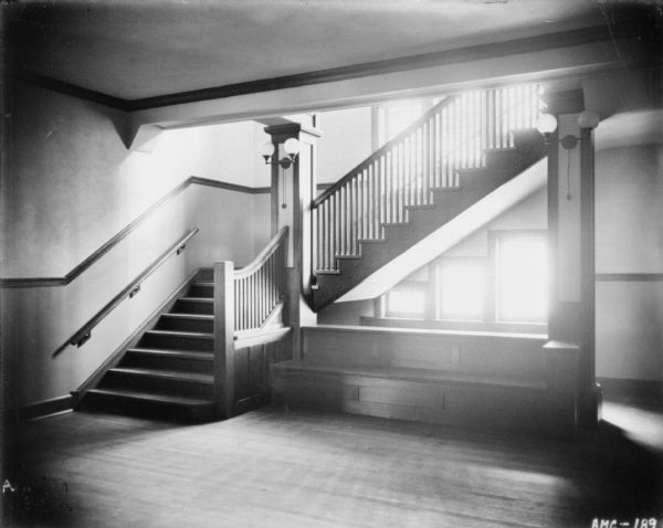 Interior view of the bottom of the stairway at the McCormick Works Club House.