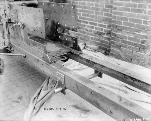 Close-up of section of hay press.