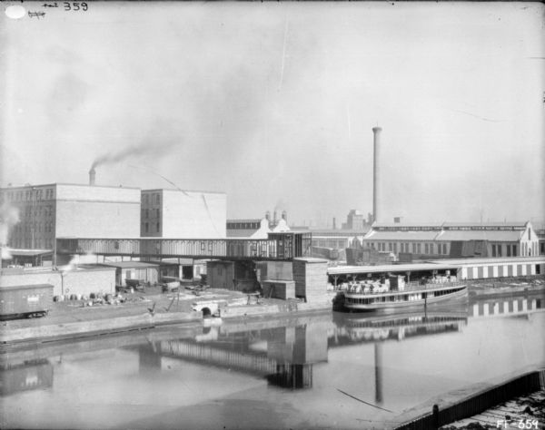 Elevated view across river of McCormick Works.
