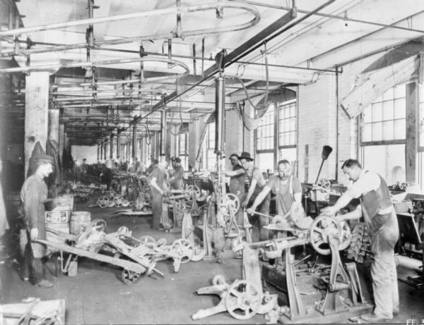 Men working in the mower room at McCormick Works.