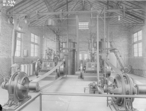 Generators indoors in a large brick building at McCormick Works.