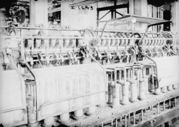 Twine spinning machines in a factory.