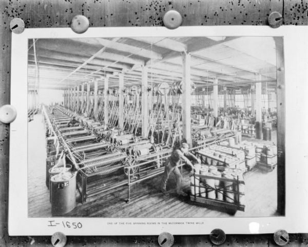 Print of one of the five spinning rooms in the McCormick Twine Mills in Chicago, Illinois.