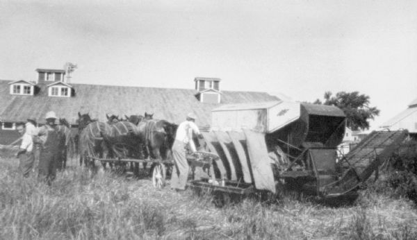 Man with Horse-Drawn Harvester-Thresher | Photograph | Wisconsin ...