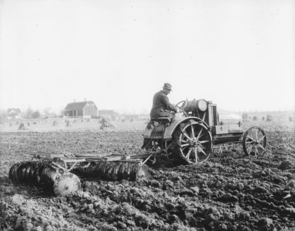 Man on Tractor Pulling Disk Harrows | Photograph | Wisconsin Historical ...