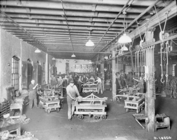 Elevated view of men working in a factory at McCormick Works.