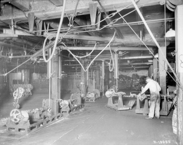 Man working in a factory building at McCormick Works.