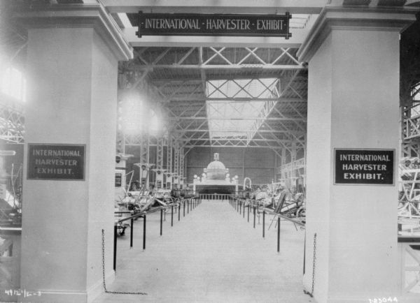 View of columned entrance to an IH exhibit with signage.