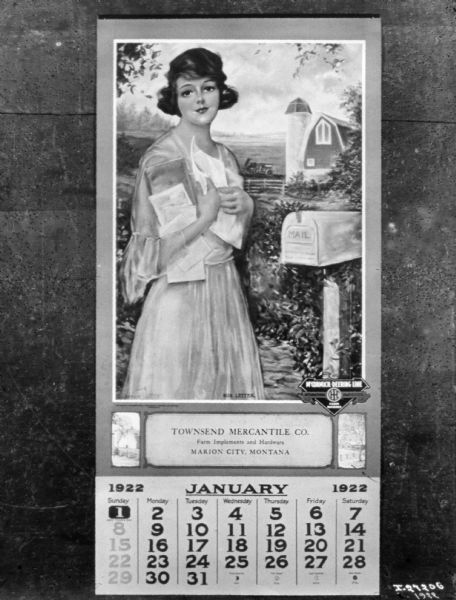 A McCormick-Deering calendar with a pinup girl. Attached to the calendar is a label for the "Townsend Mercantile Co., Farm Implements and Hardware, Marion City, Montana."
