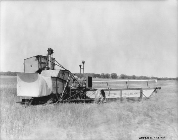 A harvester thresher in a field.