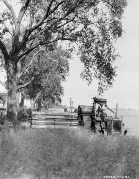 Tractor-Drawn Harvester Thresher | Photograph | Wisconsin Historical ...